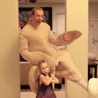 Ted Hawkes as plucked chicken, with daughter